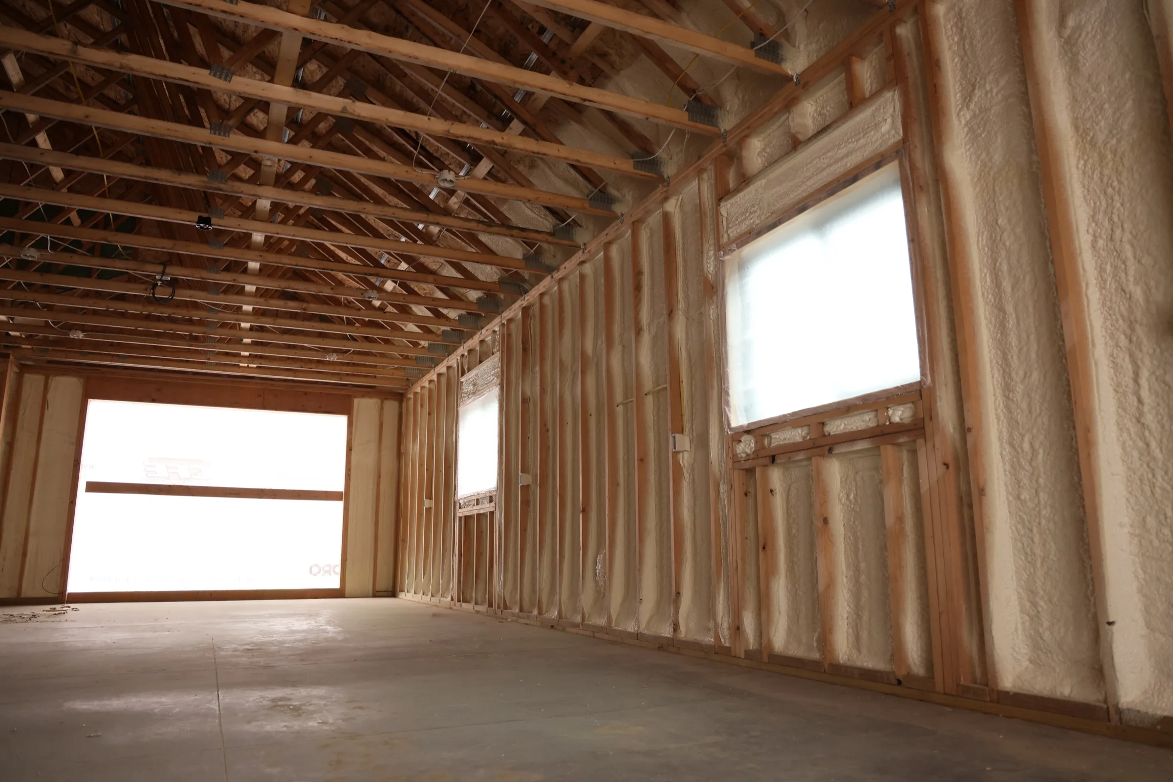 Barn interior finished with sprayed insulation